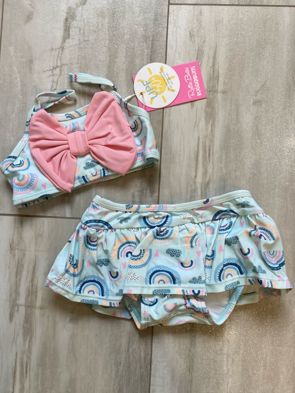 NWT RuffleButts Pastel Chase the Rainbow Bow Top Skirted Bikini girls 18-24M